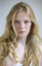 Emma Bell as 