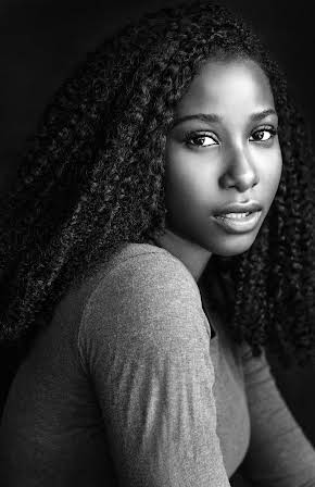 Naika Toussaint as 
