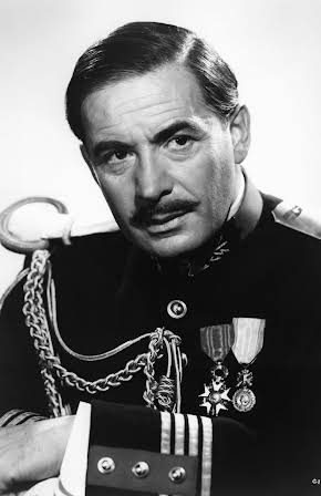 Leo Genn as 