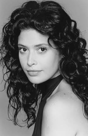Angie Cepeda as 