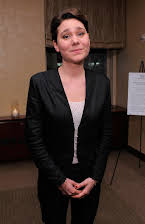 Lisa Aschan som Director