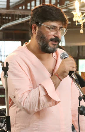 Goldie Behl as 