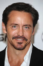 Charles Mesure as 