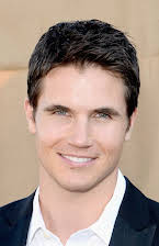 Robbie Amell as 