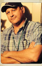 John Putch as Director