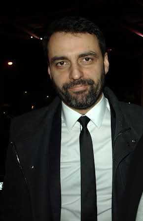 Tomasz Mandes as Director