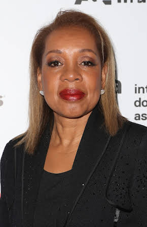 Rita Coburn Whack as Director