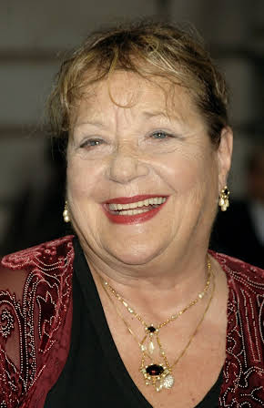 Sylvia Syms as 