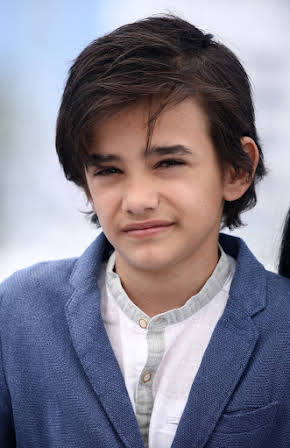 Zain Al Rafeea as 