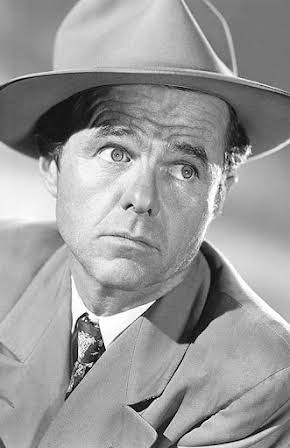 Elisha Cook Jr. as 