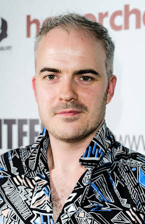 Carl Strathie as Director