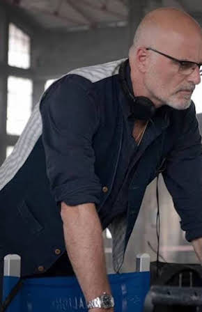 Gianluca Curti as Director