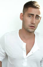 Michael Socha as 