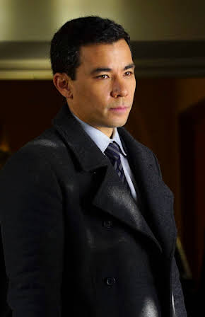 Conrad Ricamora as 