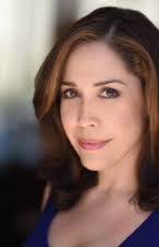 Andrea Burns as Janine