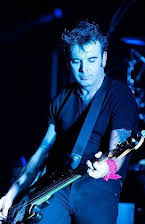 Simon Gallup as 