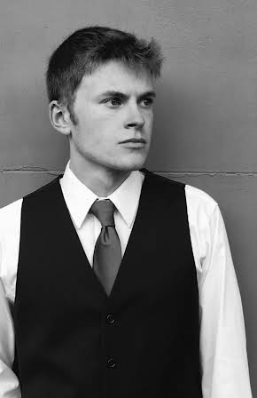 Alec Heroux as DEA Agent