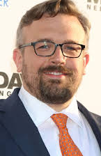 Jake Szymanski som Director