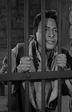 Victor Millan como Santos