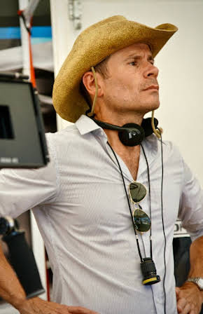 Alex Ranarivelo as Director