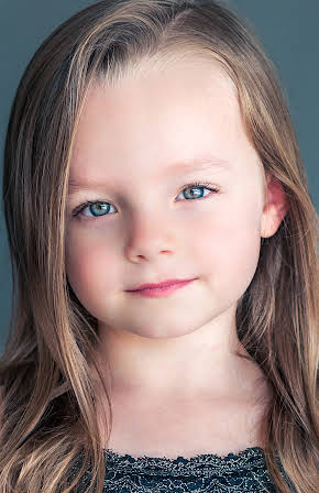 Lucy Capri as 