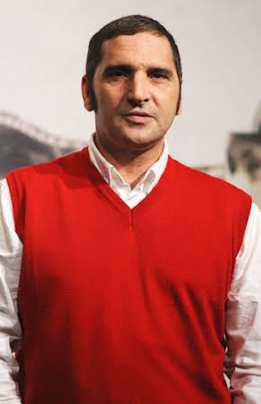 Adamo Dionisi as 