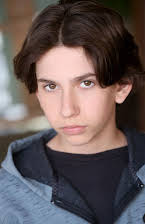 Roman Dean George as 