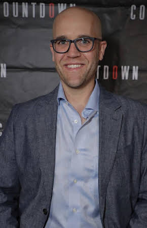 Justin Dec as Director