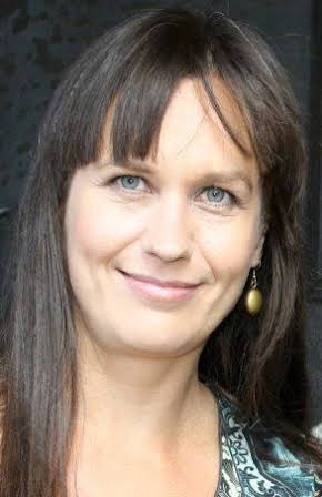 Saara Cantell as Director