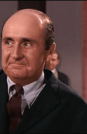 Bryan O'Byrne as Bank Teller