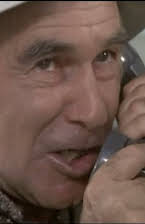 Eddie Firestone como Burke