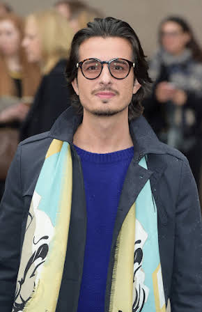 Ali F. Mostafa as Director