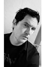 John Maringouin as Director