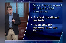 Life in Our Universe: Evidence for Fossilized Life from Mars