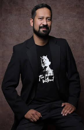 Randal Kamradt as Director