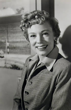 Audrey Christie as 