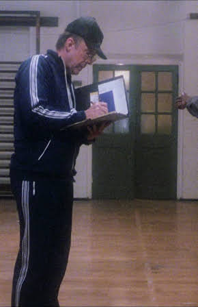 Marc Smith as Coach