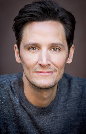 Christian Barillas as Catholic Priest