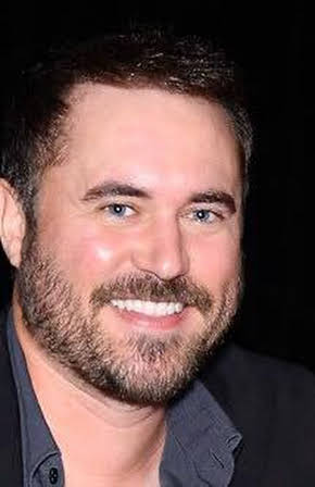 Derek Wayne Johnson as Director