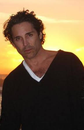 Jonathan Baker as Director