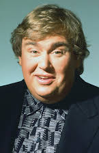 John Candy as 