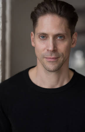 Neil Newbon as 