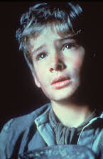 Mark Lester as 