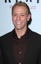 Adam Pascal som 