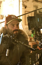 Jonathan Helpert som Director