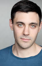 Liam Garrigan as 