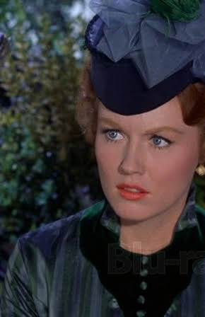Elaine Devry as Secretary