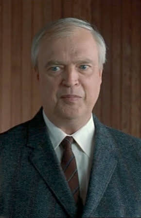 Larry Reese as Jolly Minister