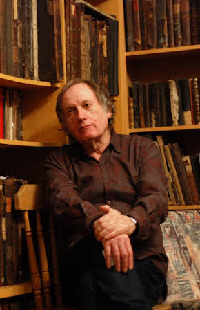 Robert Mullan as Director