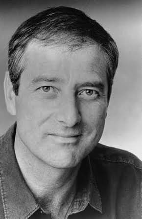 Julian Wadham as 